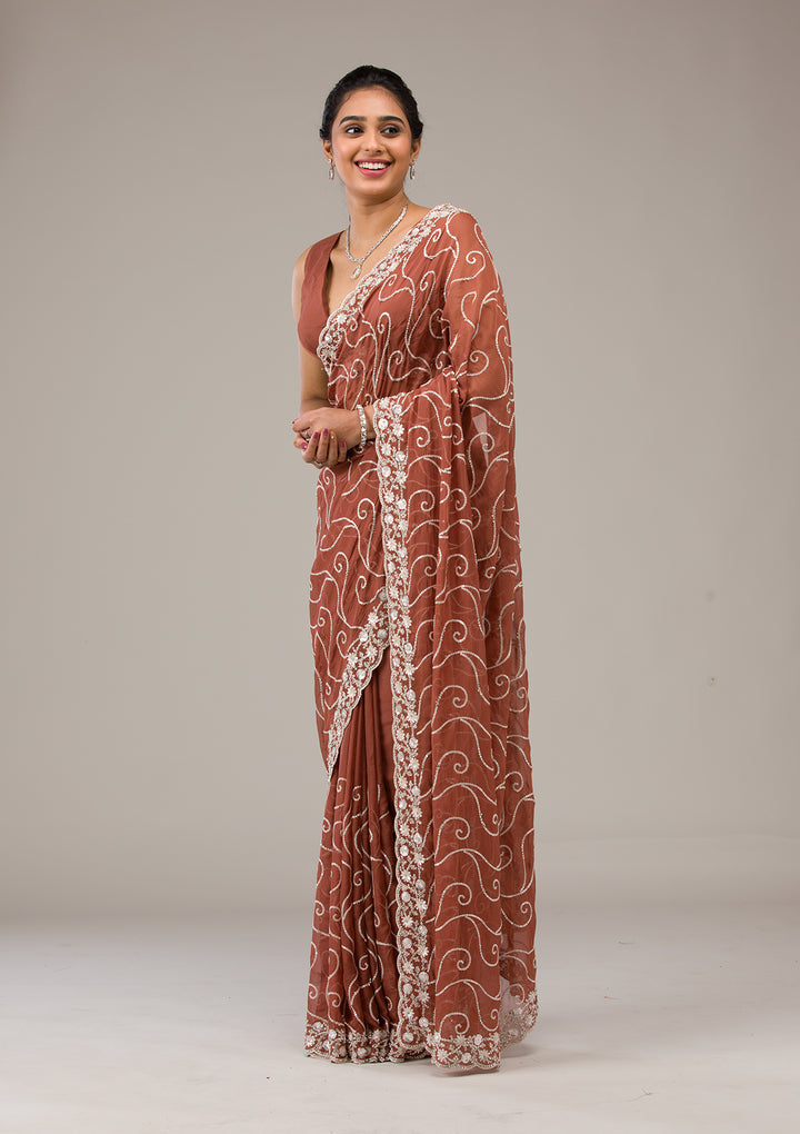 Rust Sequins Georgette Saree