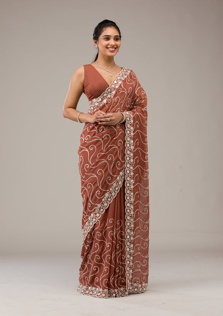 Rust Sequins Georgette Saree