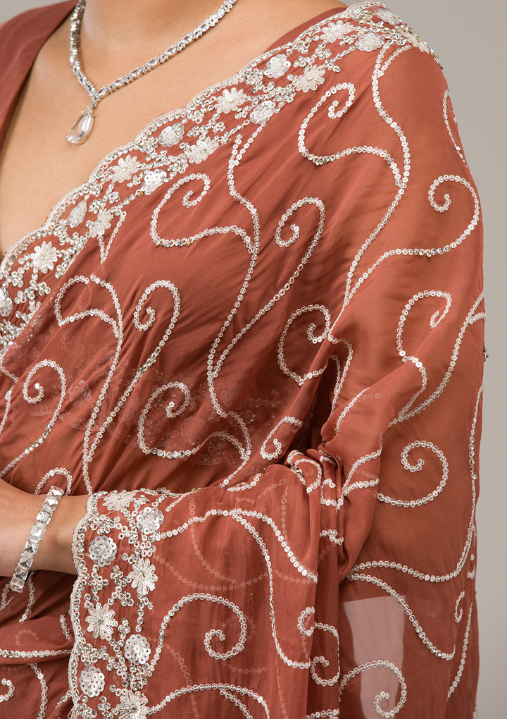 Rust Sequins Georgette Saree