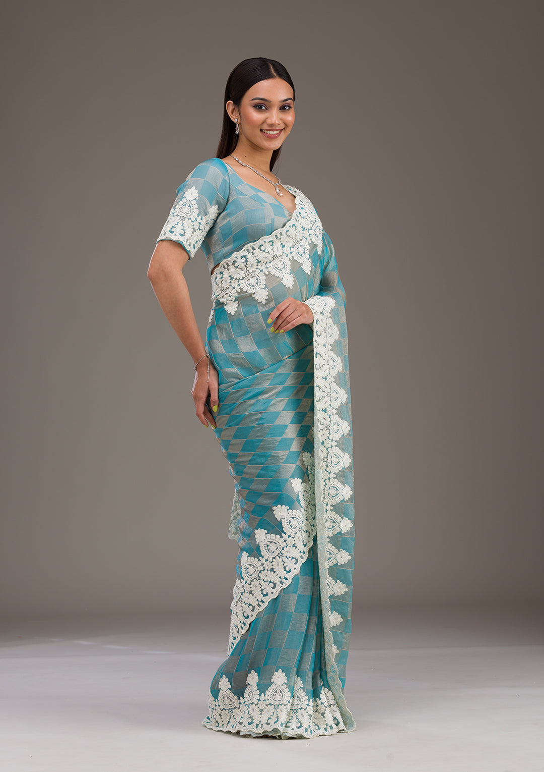 Turquoise Blue Pearlwork Tissue Saree