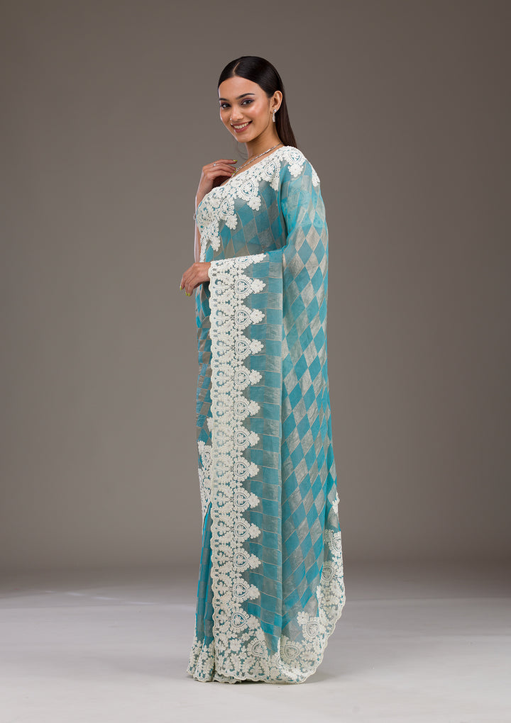 Turquoise Blue Pearlwork Tissue Saree