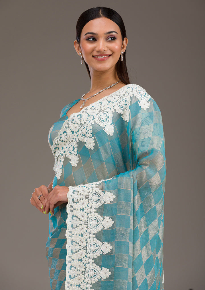 Turquoise Blue Pearlwork Tissue Saree