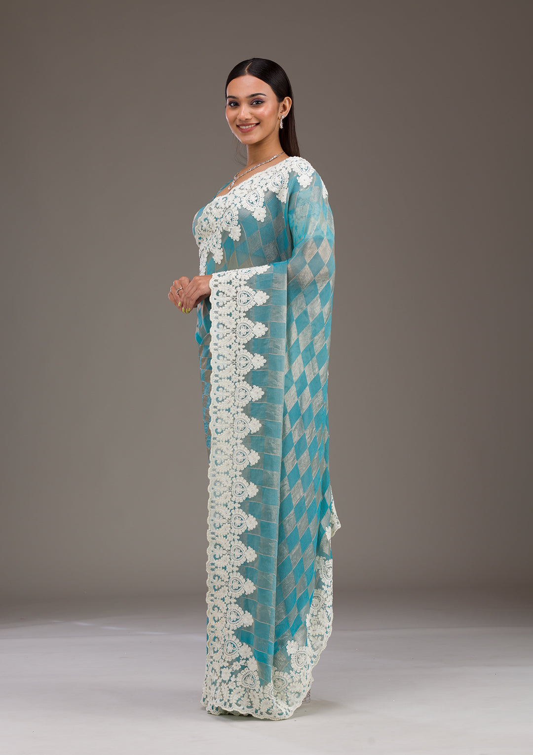 Turquoise Blue Pearlwork Tissue Saree