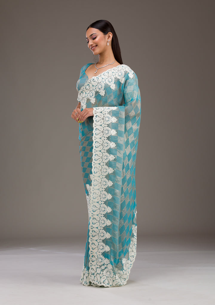 Turquoise Blue Pearlwork Tissue Saree