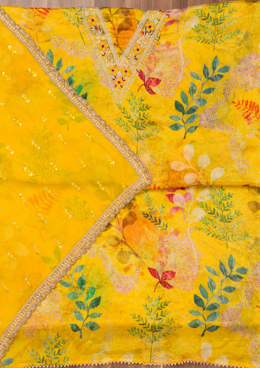 Yellow Printed Semi Crepe Unstitched Salwar Suit