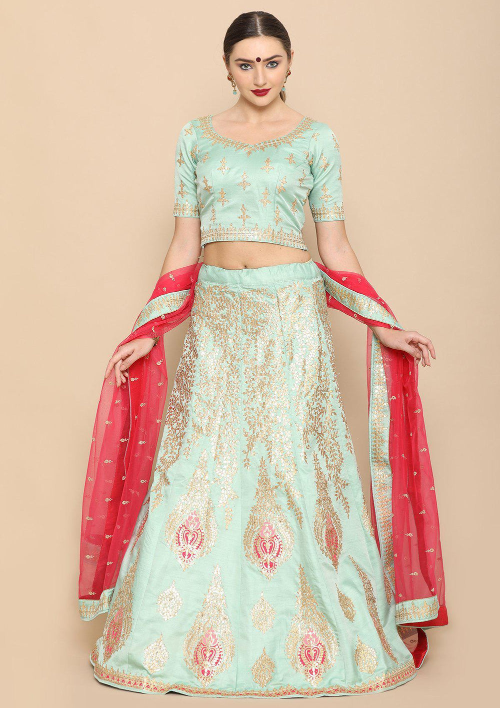 Sea Green And Rani pink designer Lehenga-Koskii