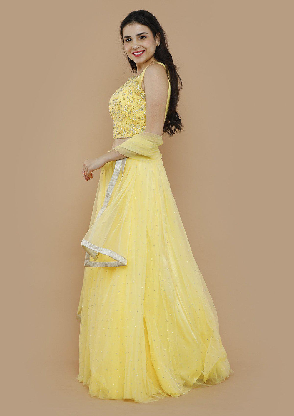 Yellow Sequinned Net Designer Lehenga-Koskii