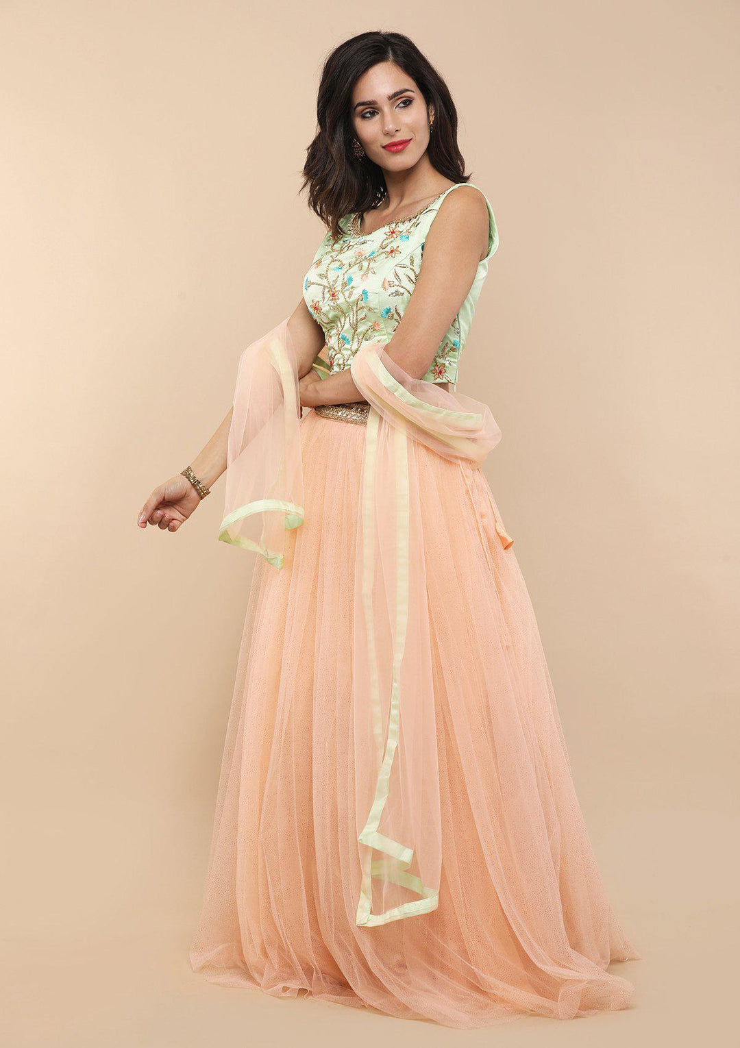 Green and Peach Silk Designer Lehenga-Koskii