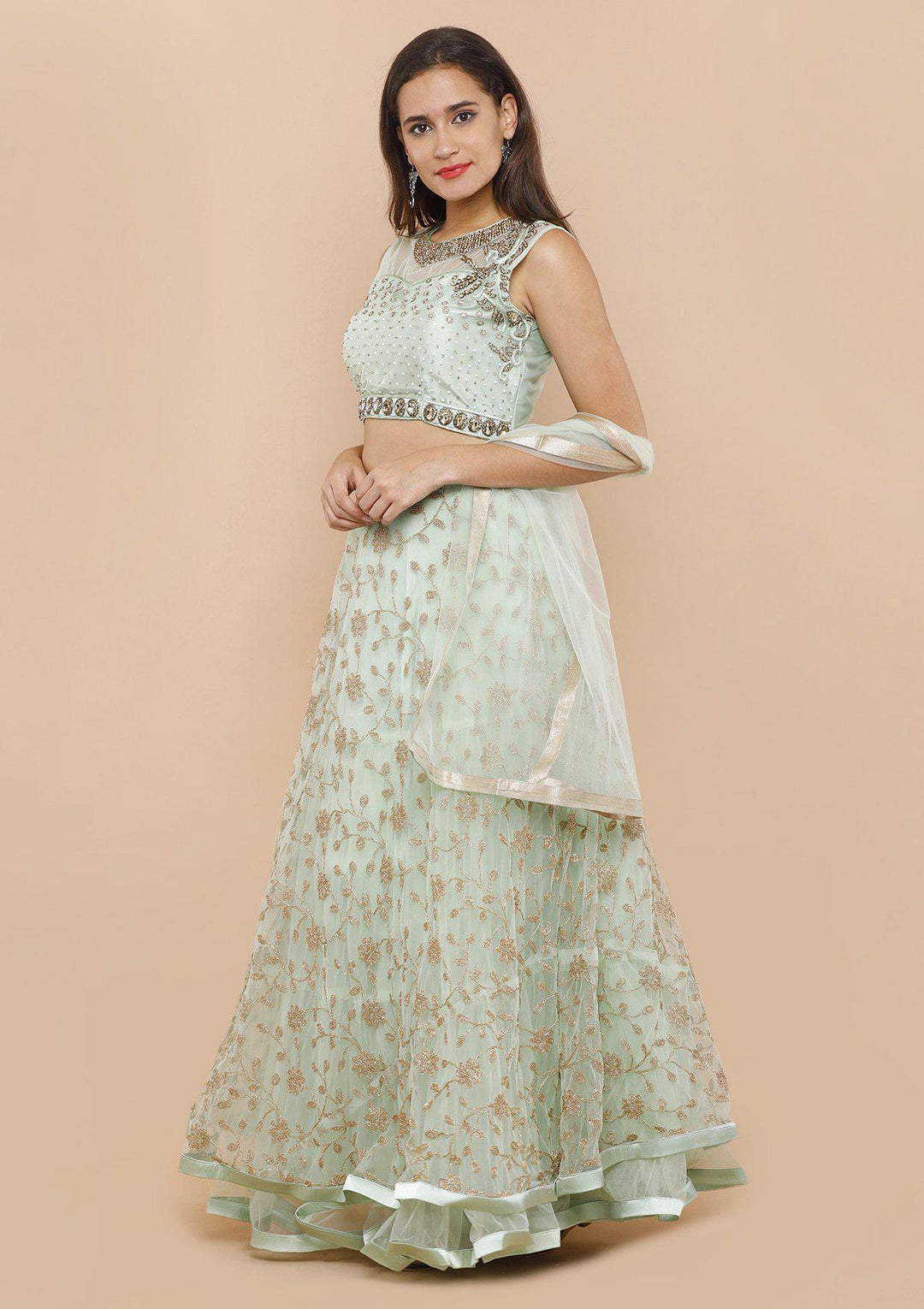 koskii seafoam green and gold net lehenga-Koskii