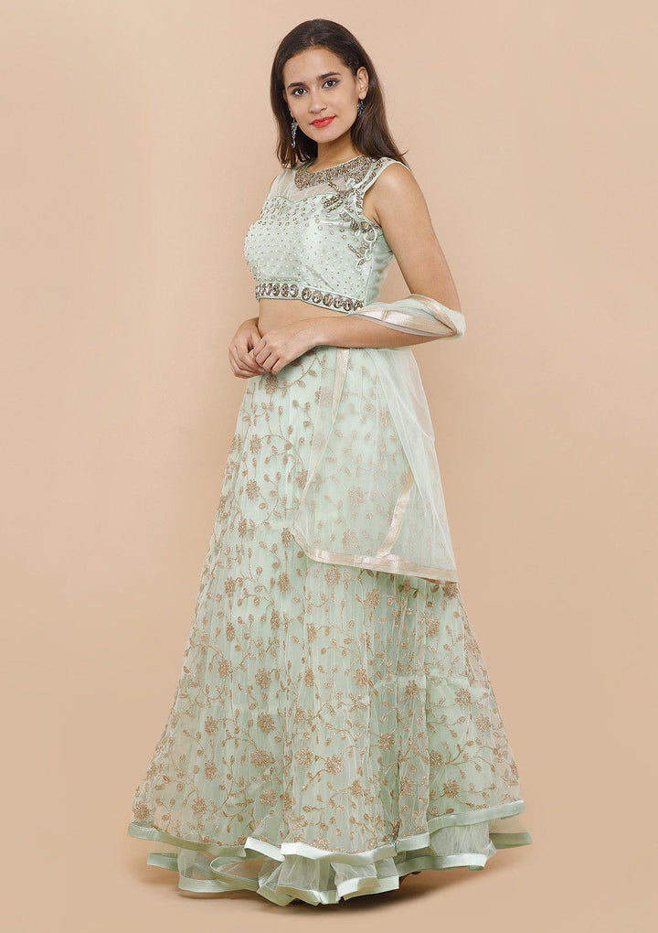 koskii seafoam green and gold net lehenga-Koskii