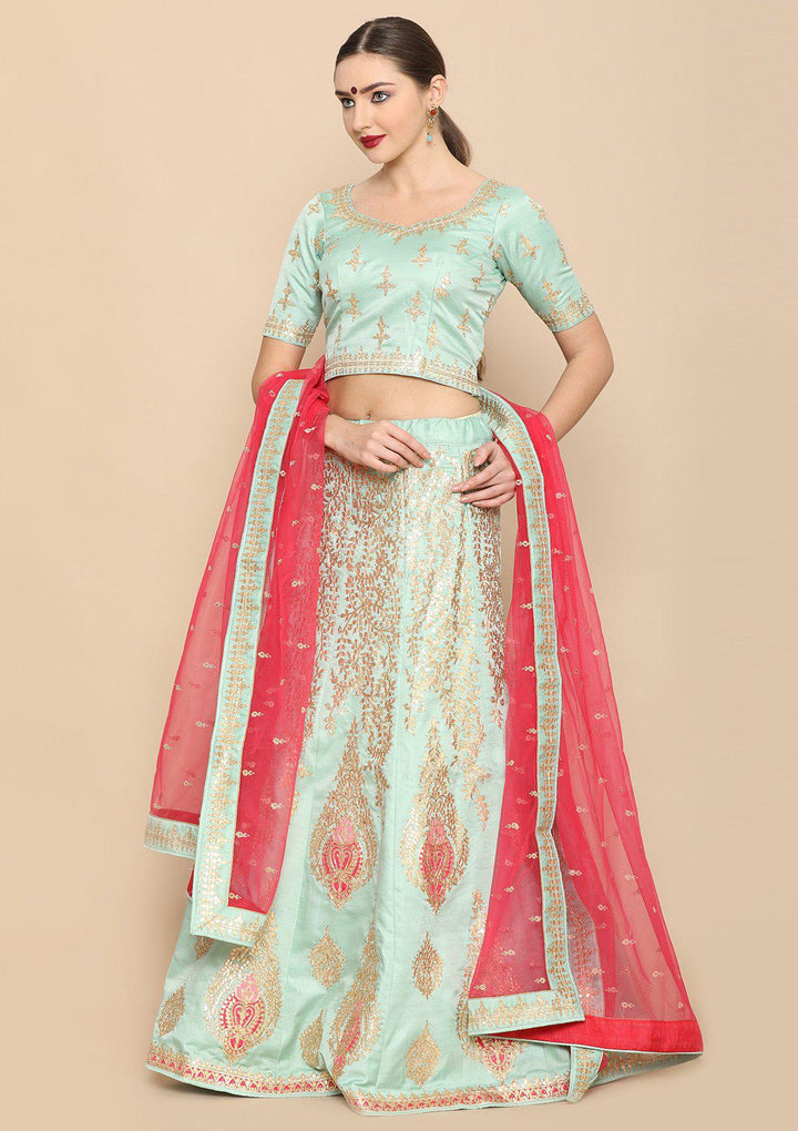 Sea Green And Rani pink designer Lehenga-Koskii