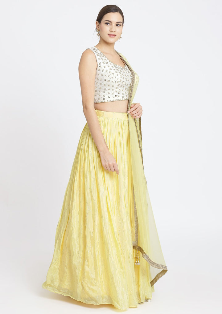 Yellow and Off-White Mirrorwork Satin Designer Lehenga-Koskii