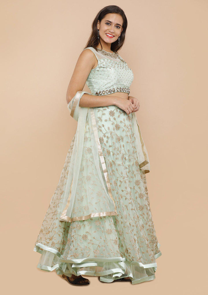 koskii seafoam green and gold net lehenga-Koskii