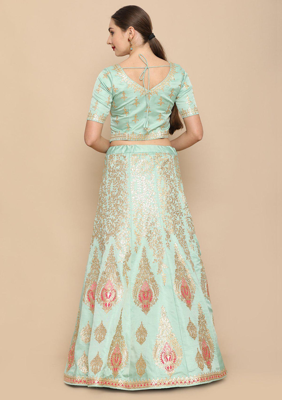 Sea Green And Rani pink designer Lehenga-Koskii