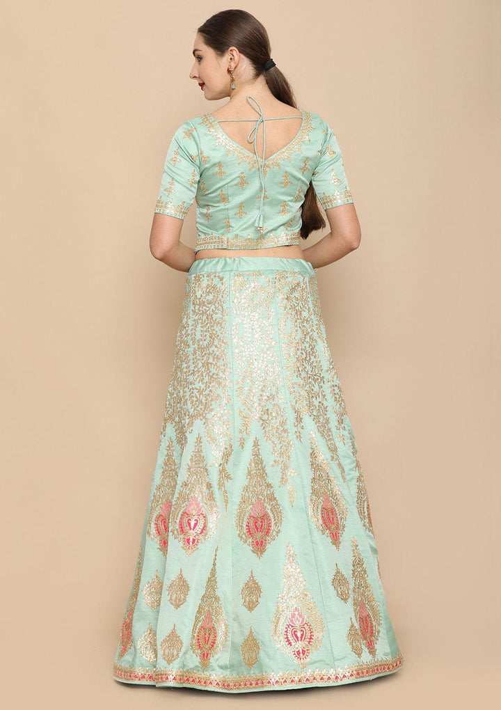 Sea Green And Rani pink designer Lehenga-Koskii