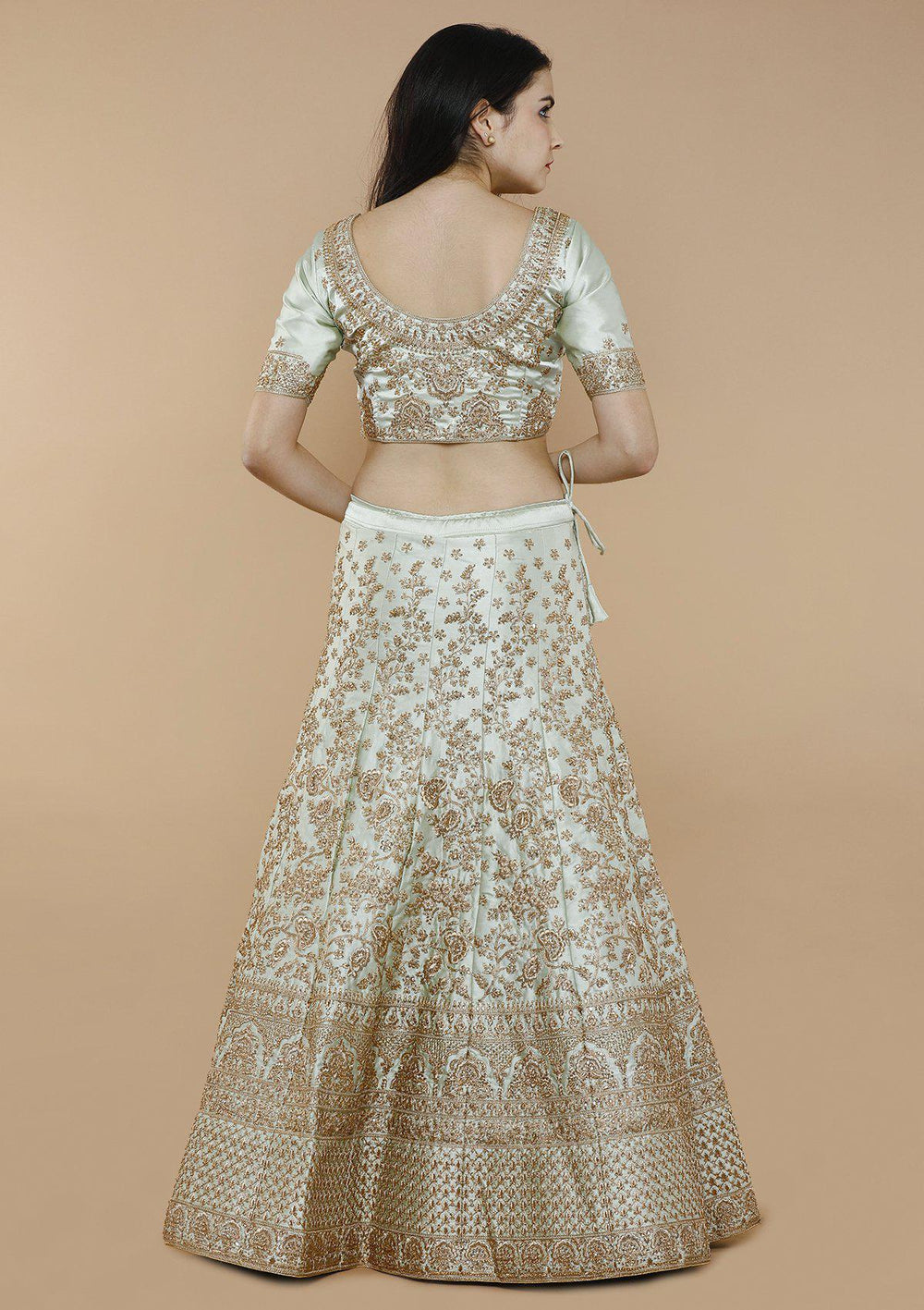koskii green and gold silk bridal lehenga-Koskii