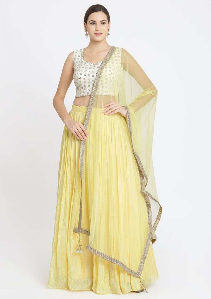 Yellow and Off-White Mirrorwork Satin Designer Lehenga-Koskii