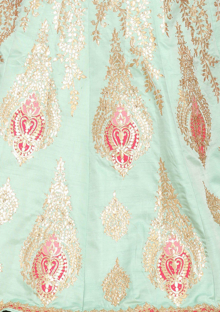 Sea Green And Rani pink designer Lehenga-Koskii