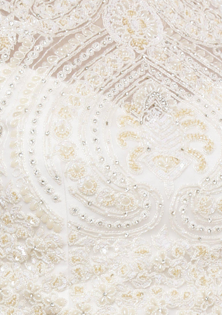 koskii ivory pearl and stone work lehenga-Koskii