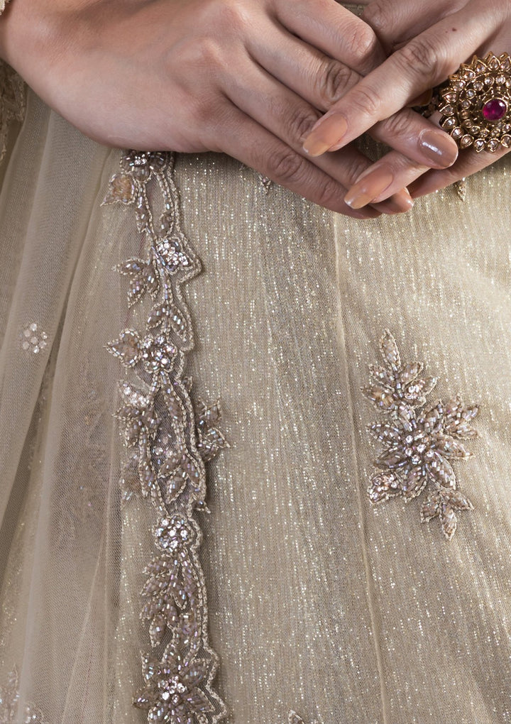 Beige Sequinned Net Designer Lehenga-Koskii
