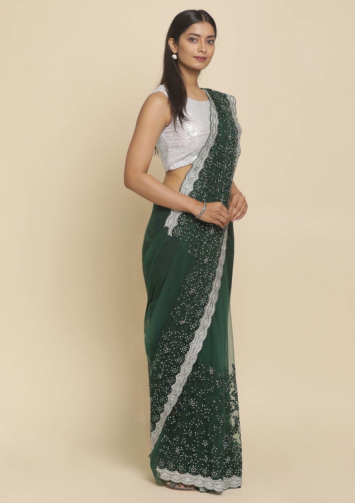 Mugdha weaves on Instagram: “Beautiful client in a nice silver saree paired  with bottle green blouse @mugdh… | Bottle green blouse, Silk saree blouse  designs, Saree