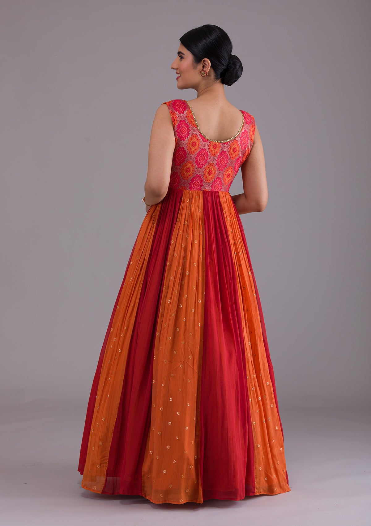 Orange colour gown 2025