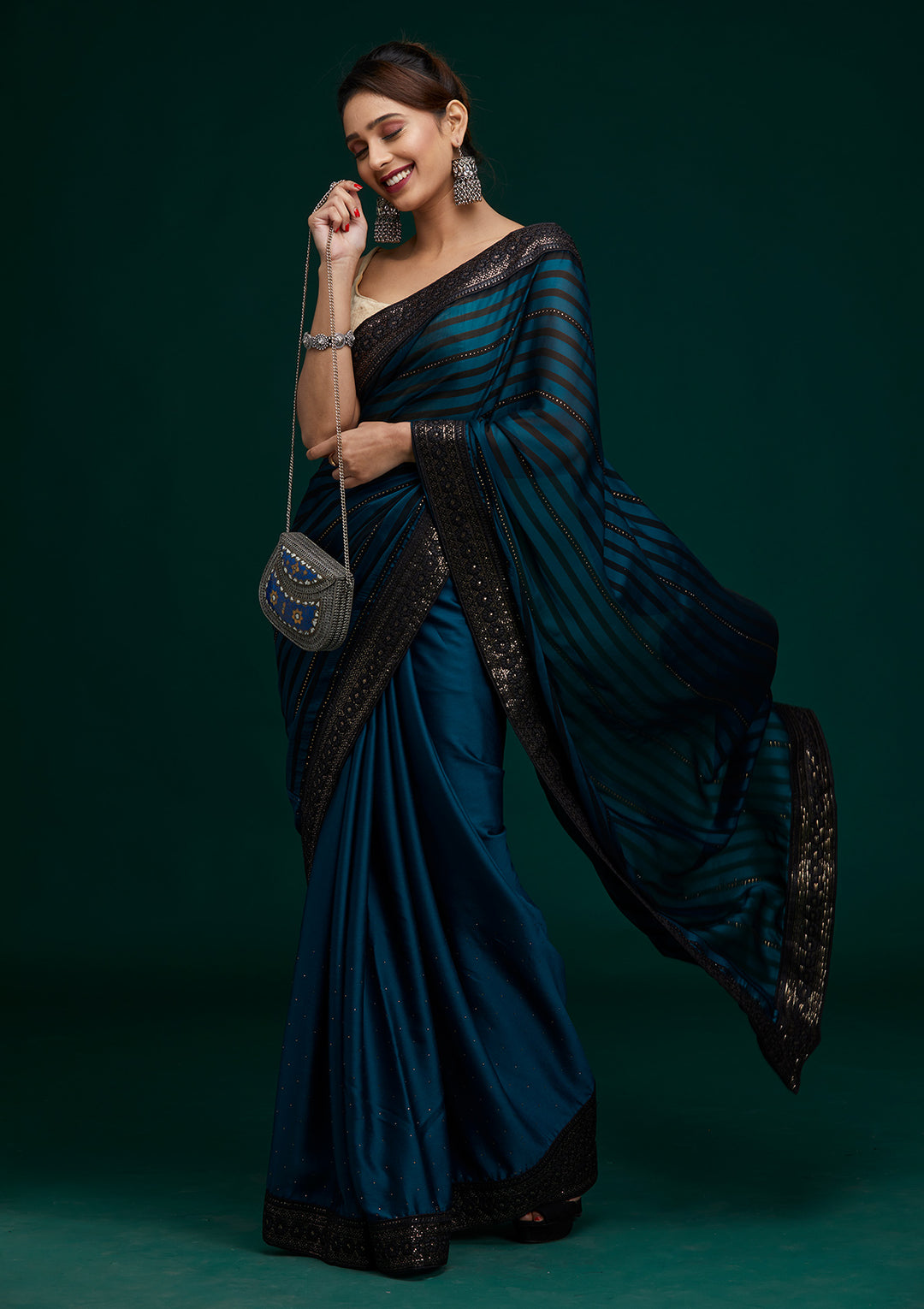 Peacock Blue Swarovski Georgette Saree- Koskii