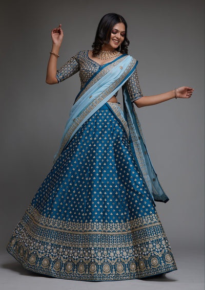 Peacock Blue Zariwork Raw Silk Designer Lehenga- Koskii