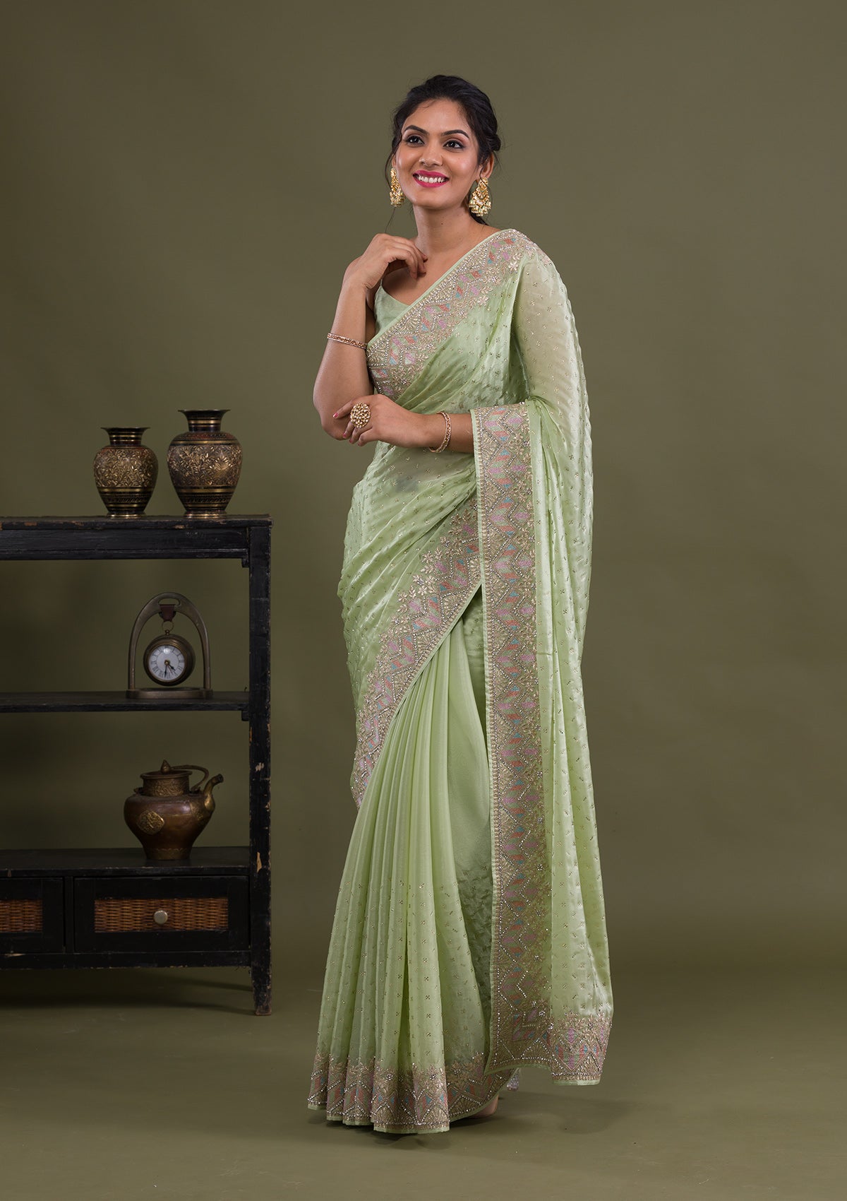 pista green saree with silver blouse