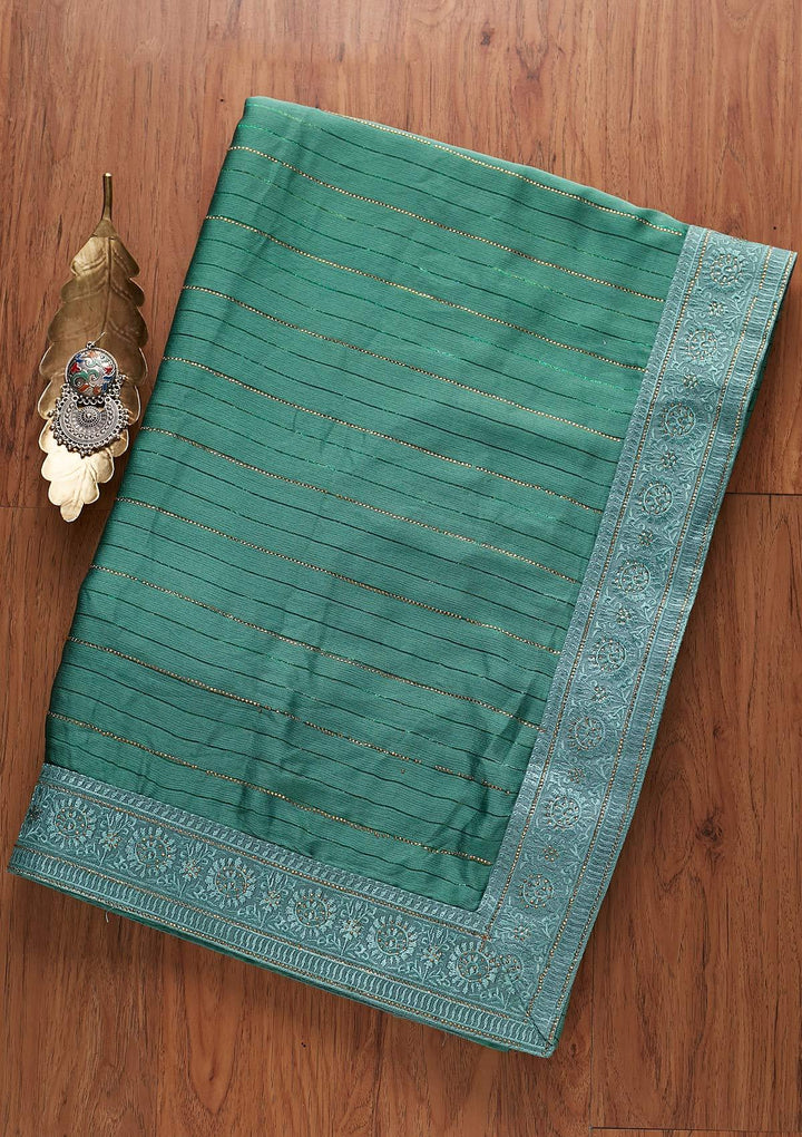 Sea Green Swarovski Georgette Designer Saree - koskii