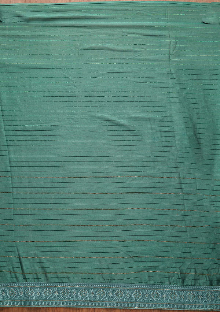 Sea Green Swarovski Georgette Designer Saree - koskii