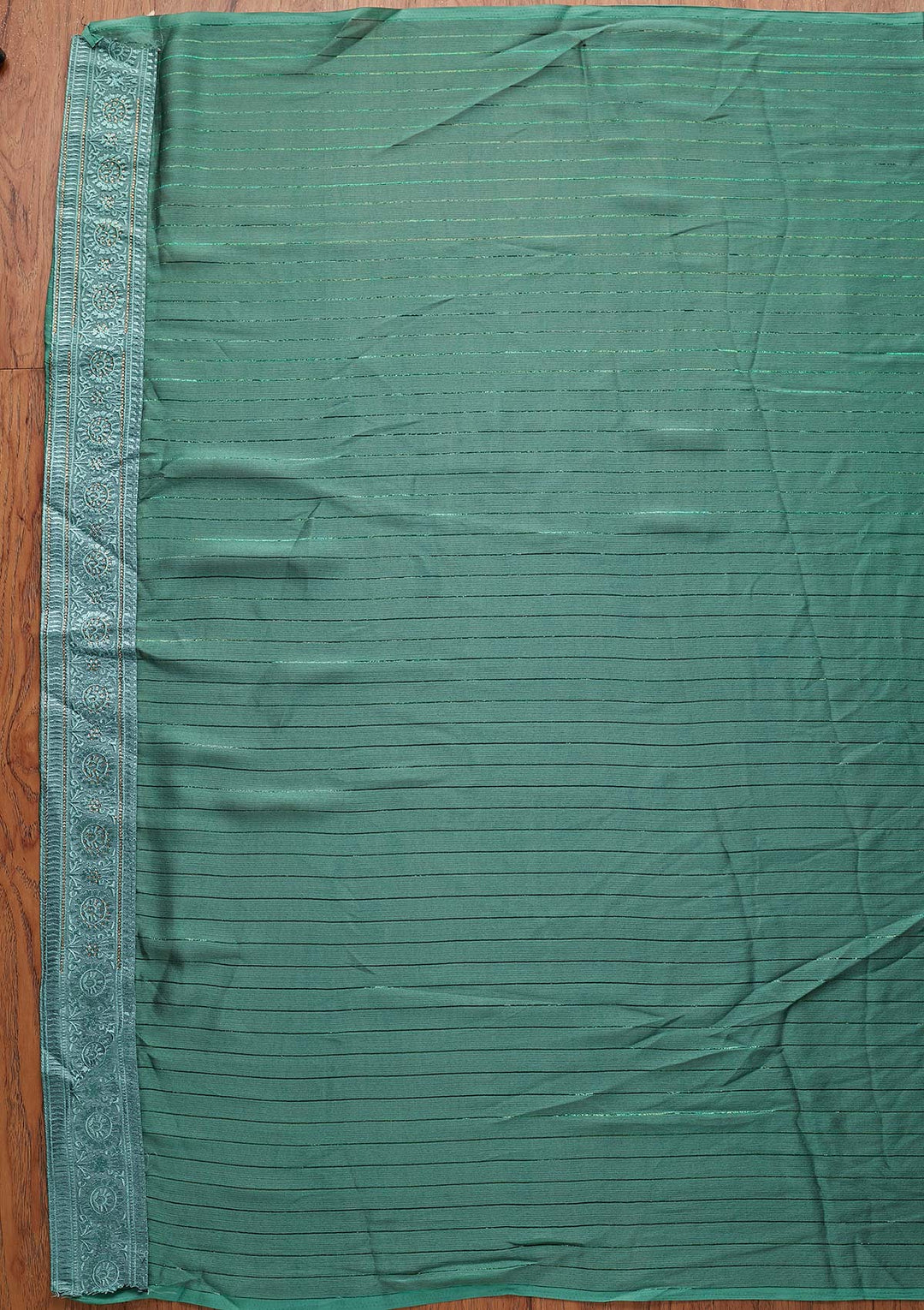 Sea Green Swarovski Georgette Designer Saree - koskii