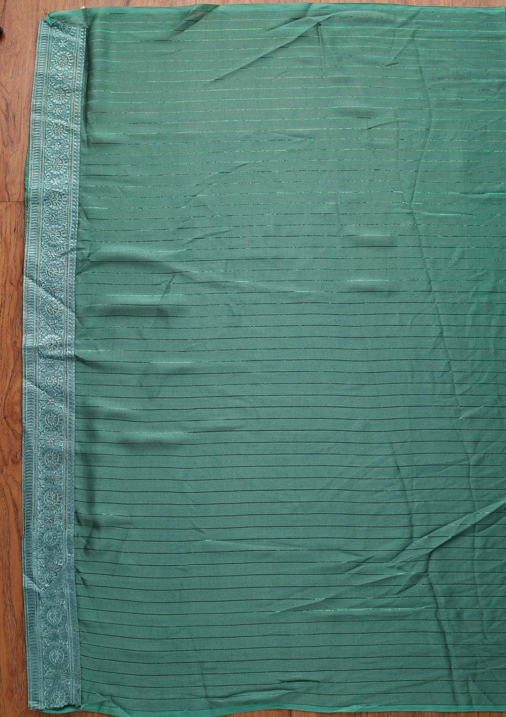 Sea Green Swarovski Georgette Designer Saree - koskii